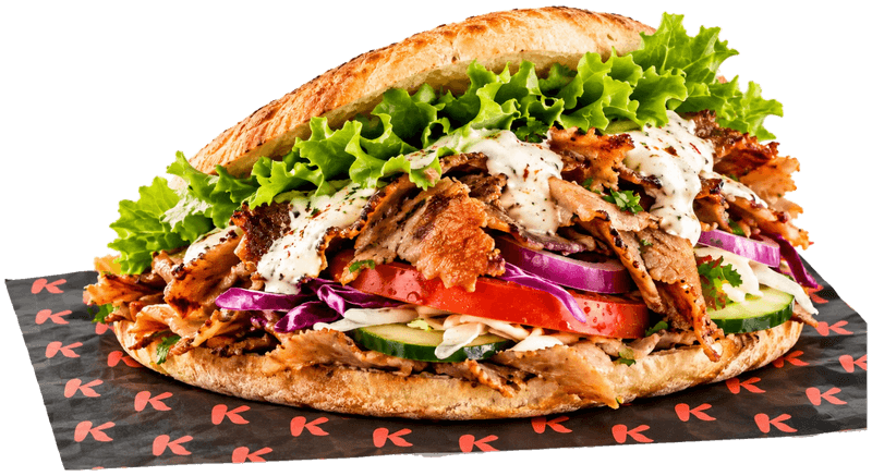 Kebab pita roll with kebab meat, red onion and white sauce, in K paper
