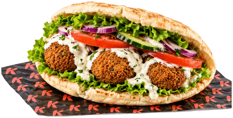 Vegetarian pita roll with falafel, tomato, cucumber, lettuce and white sauce, on K paper
