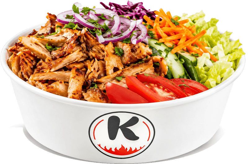 Kebab plate in a K bowl with kebab meat, red onion, carrots, tomato and salad