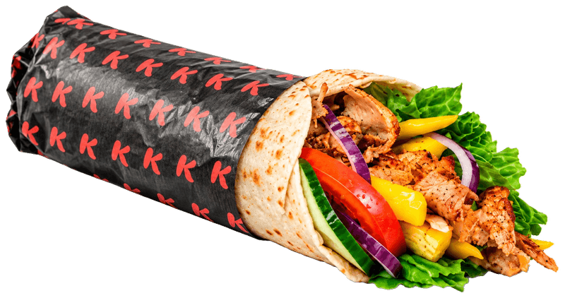 Pita Grande in black paper with red Ks, packed with kebab meat, tomato, cucumber, red onion and lettuce