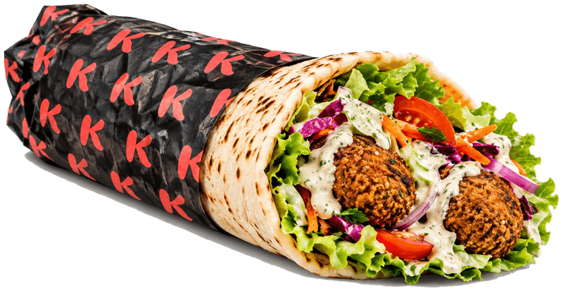 Vegetarian pita with falafel, red cabbage, carrots, tomato and white sauce, wrapped in K paper